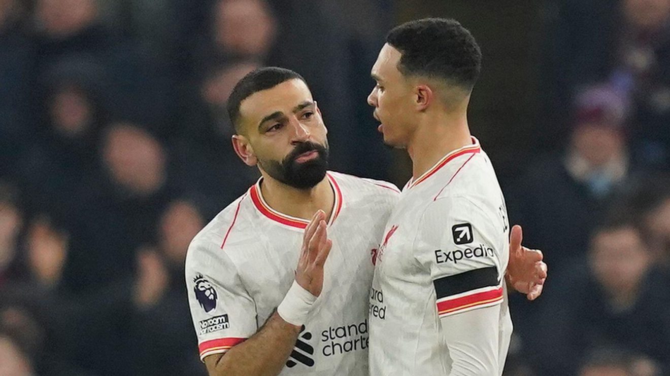 Liverpool teammates Mo Salah and Trent Alexander-Arnold embrace