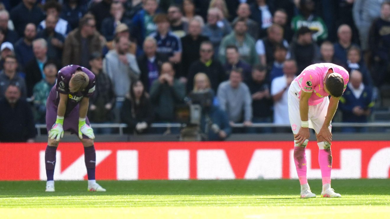 Aaron Ramsdale and Jan Bednarek both bend down with their hands on their knees in dejected fashion