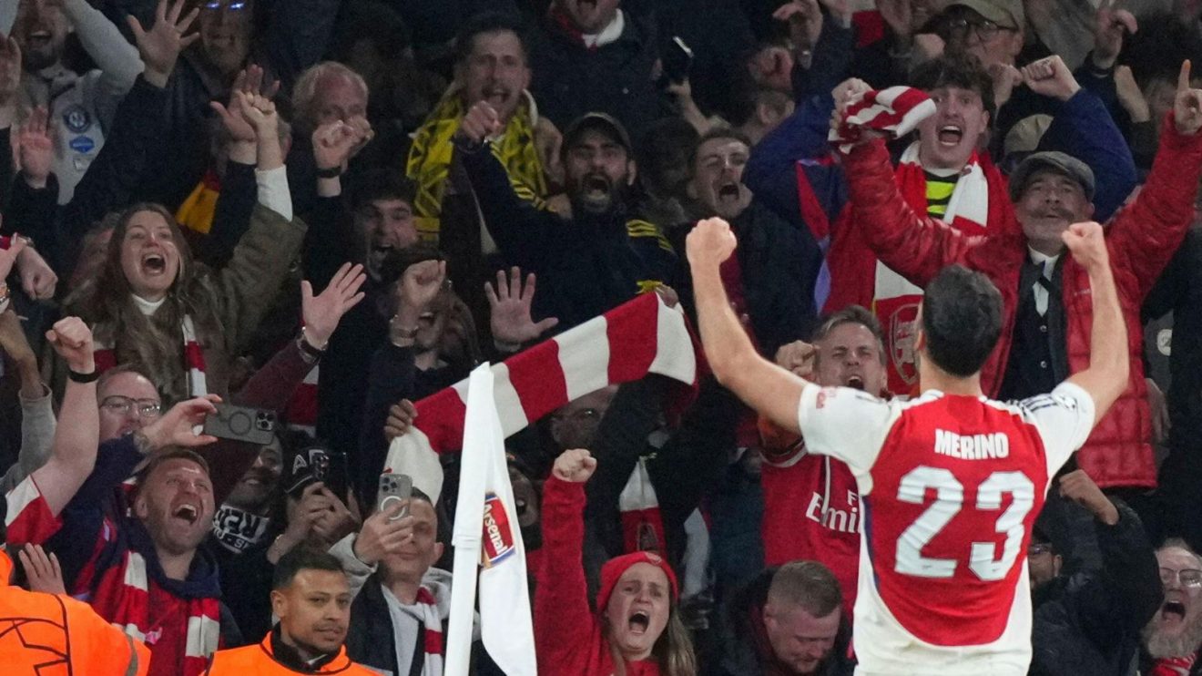 Arsenal player Mikel Merino celebrates with the fans after scoring against Real Madrid