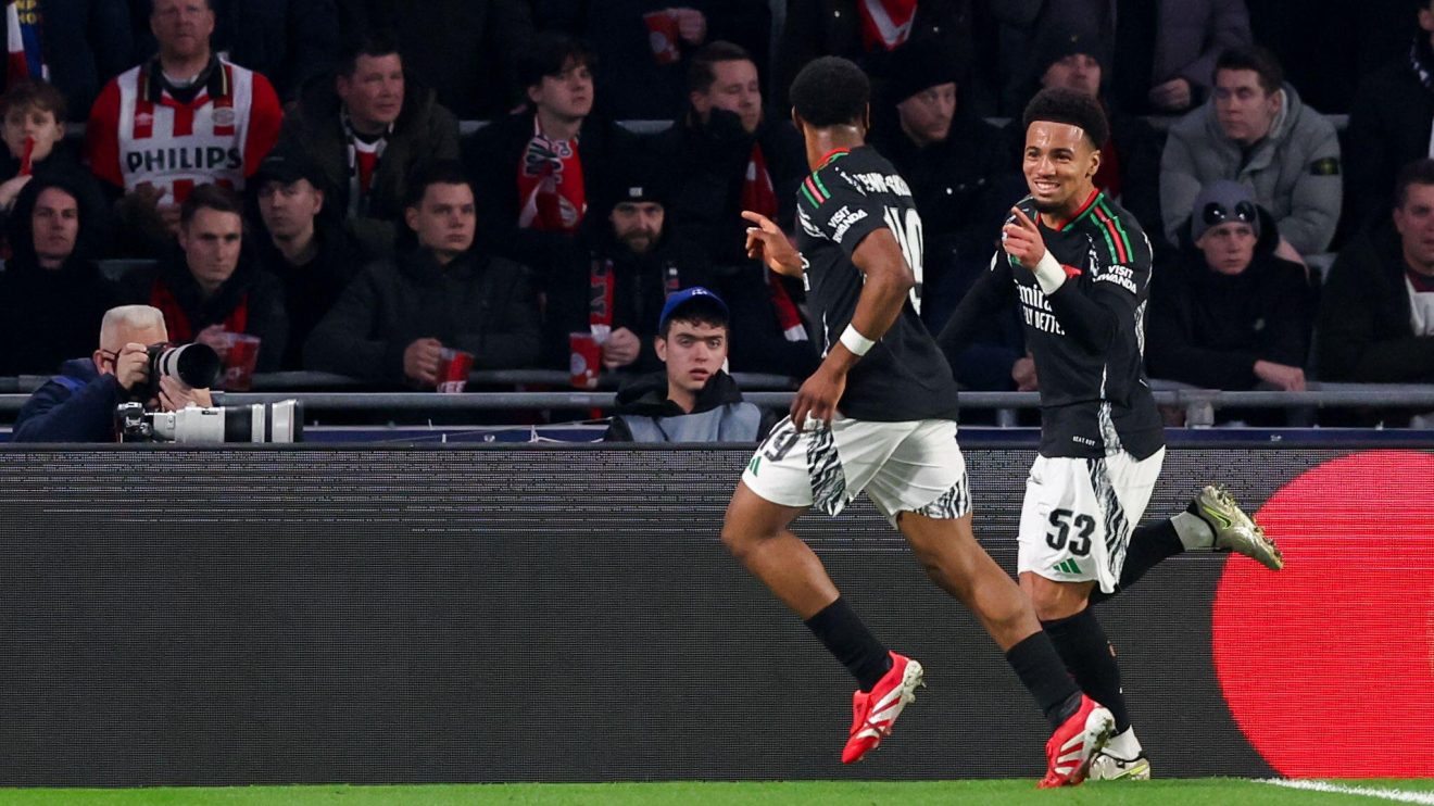 Ethan Nwaneri celebrates an Arsenal goal with Myles Lewis-Skelly