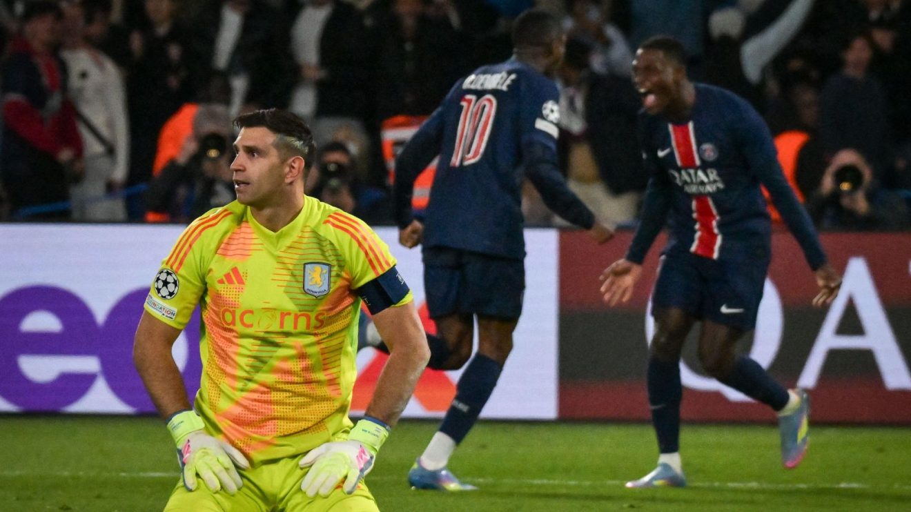 Aston Villa keeper Emiliano Martinez reacts after conceding against Paris Saint-Germain