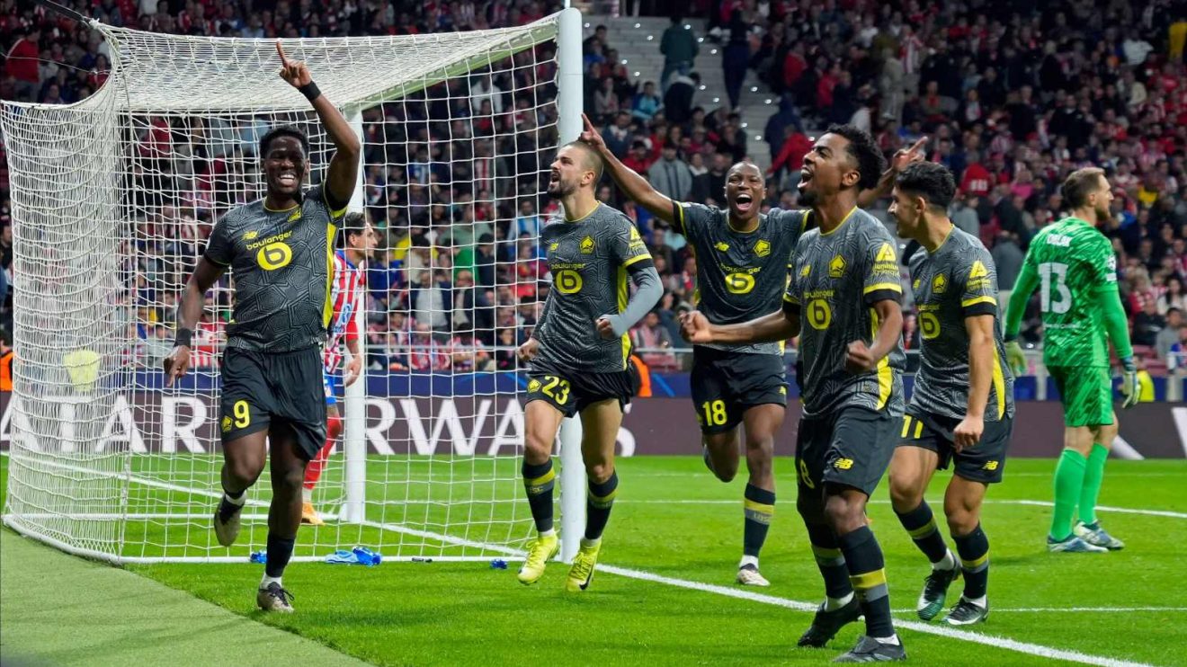 Arsenal target Jonathan David (left) celebrates his goal