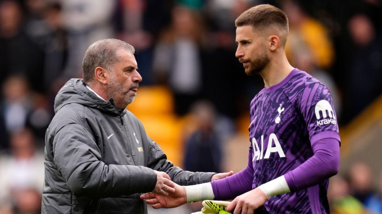 Spurs manager Ange Postecoglou embraces goalkeeper Guglielmo Vicario
