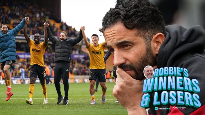 Ruben Amorim looks tense while Wolves players celebrate.