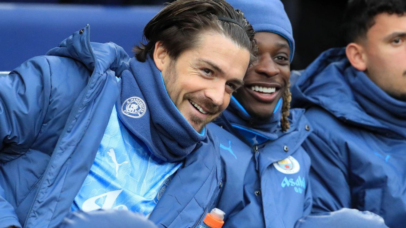 Man City winger Jack Grealish sitting on the bench