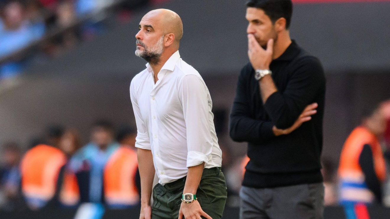 Pep Guardiola and Mikel Arteta look on during a game