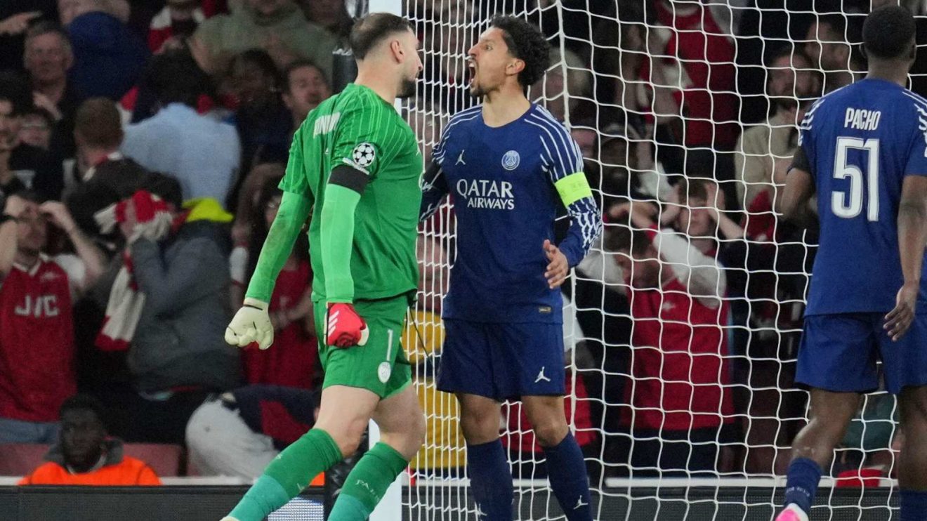 Arsenal v PSG: Gianluigi Donnarumma and Marquinhos celebrate a save