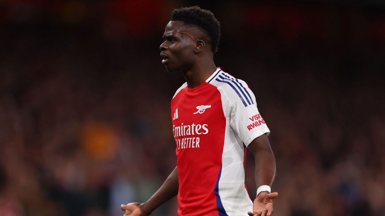 Arsenal forward Bukayo Saka argues with a refereeing decision