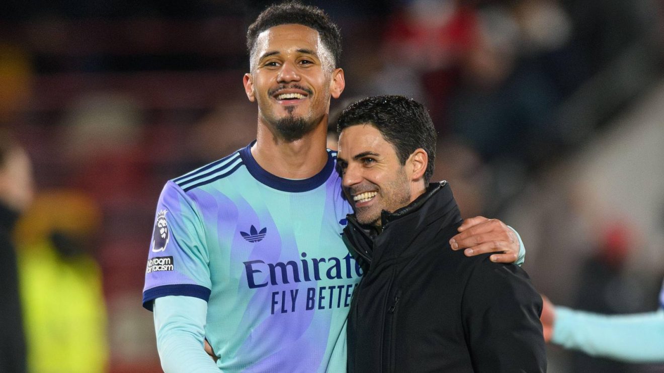 Arsenal defender and manager William Saliba and Mikel Arteta celebrate a win