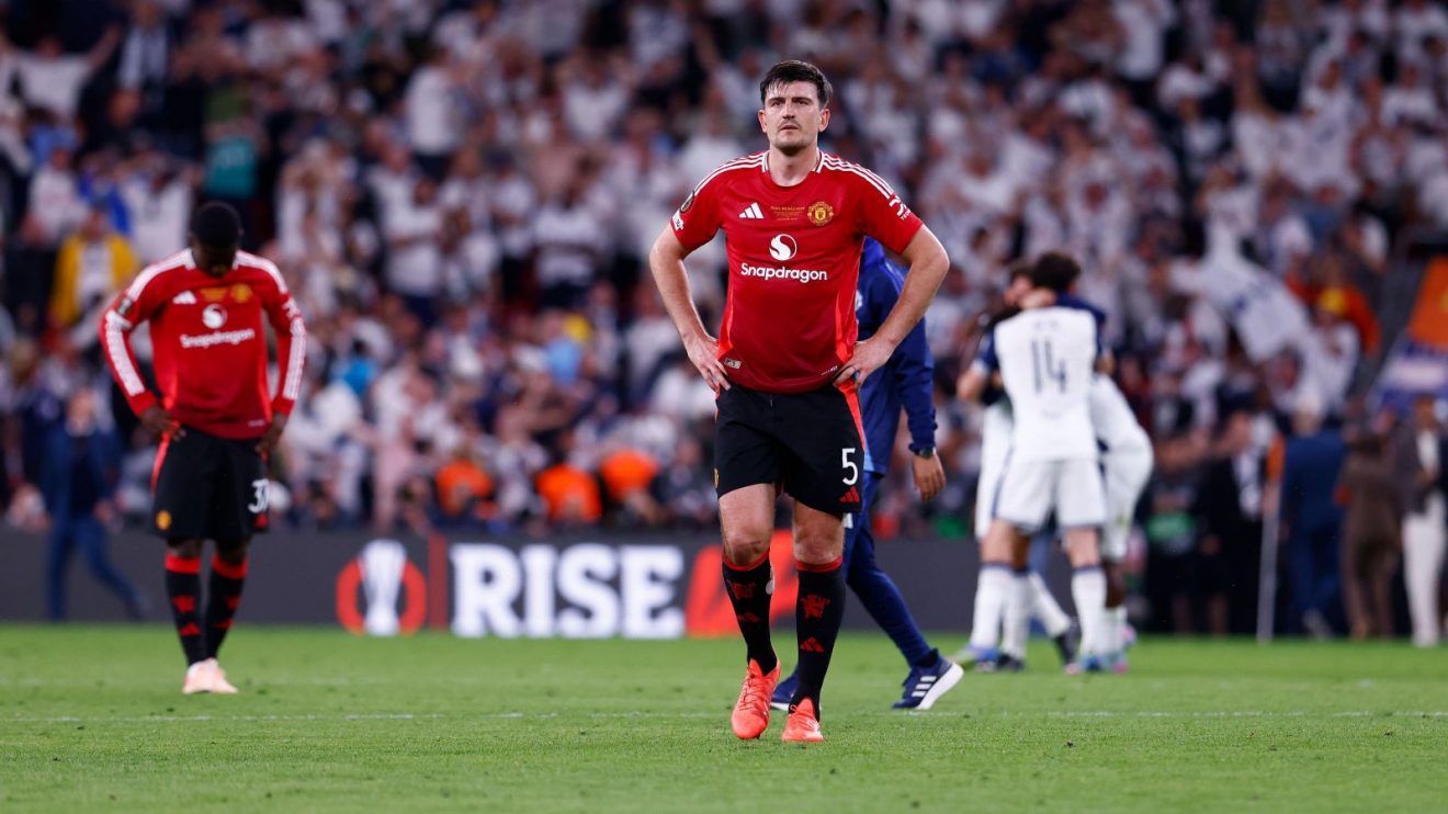 Manchester United defender Harry Maguire reacts as Spurs win the Europa League