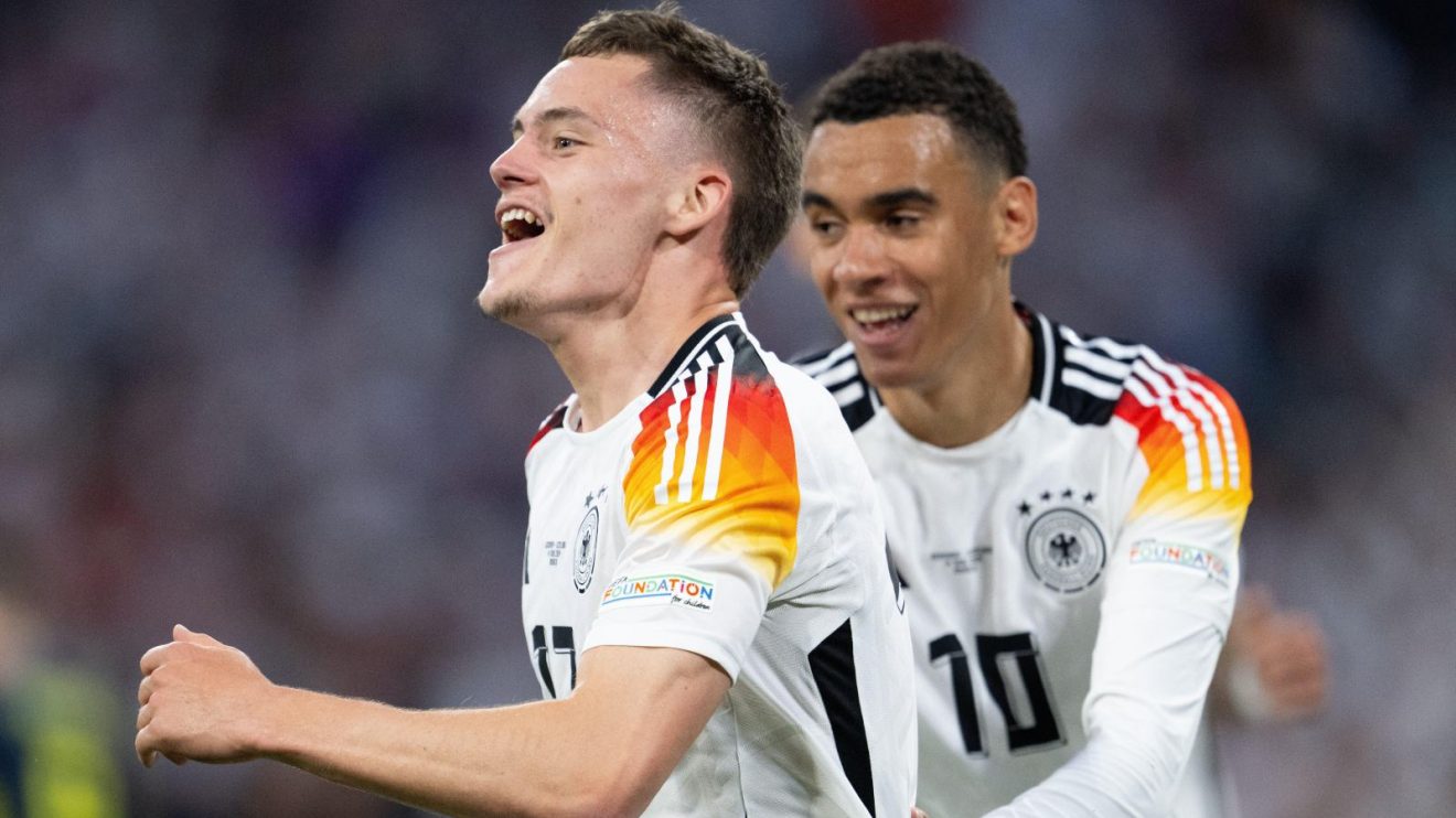 Liverpool-linked Germany player Florian Wirtz celebrates a goal with Jamal Musiala