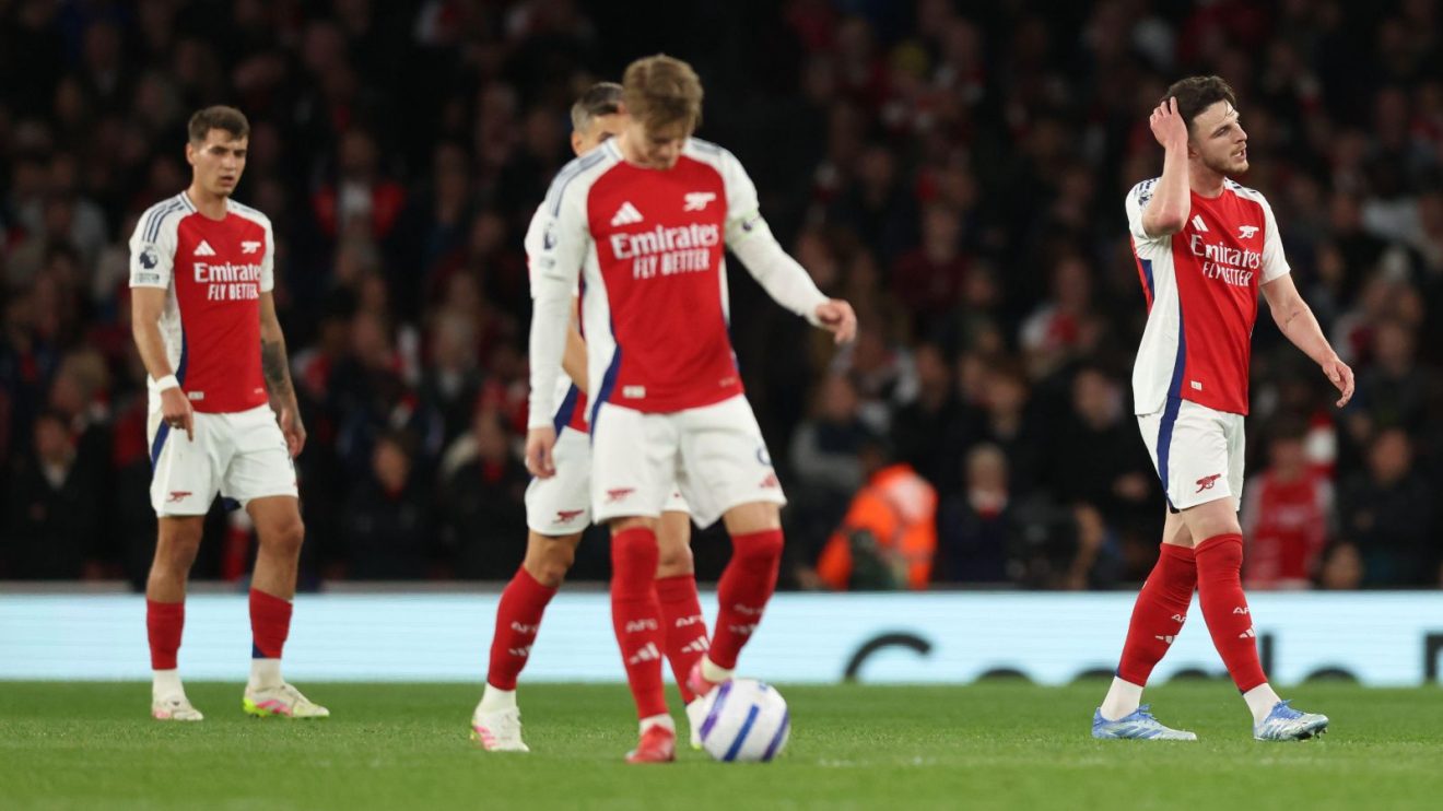 Arsenal players including Martin Odegaard and Declan Rice dejected after conceding to Crystal Palace