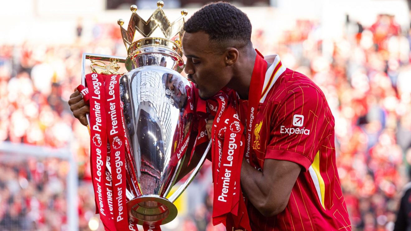 Liverpool's Ryan Gravenberch kisses the Premier League trophy