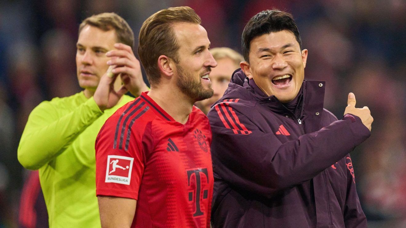 Bayern defender Kim Min-jae laughs with Harry Kane after a match