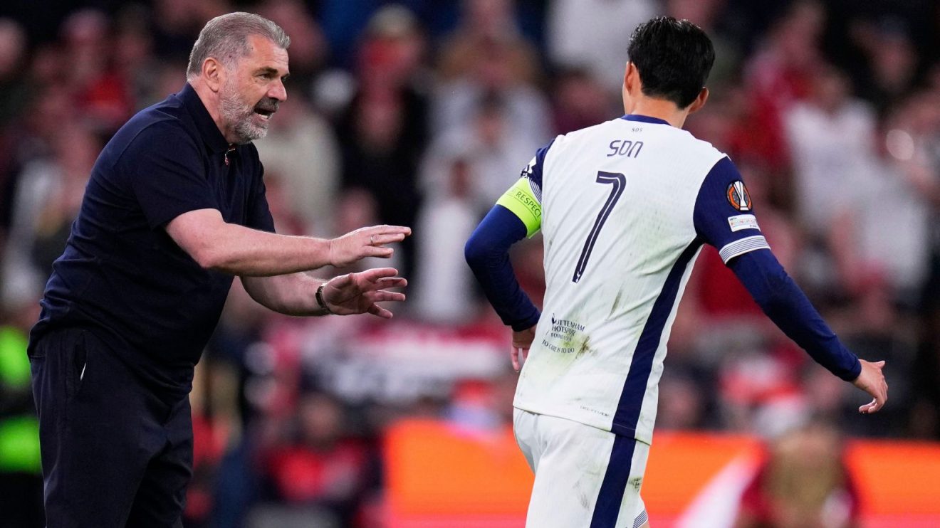 Spurs captain Heung-min Son receives instructions from Ange Postecoglou