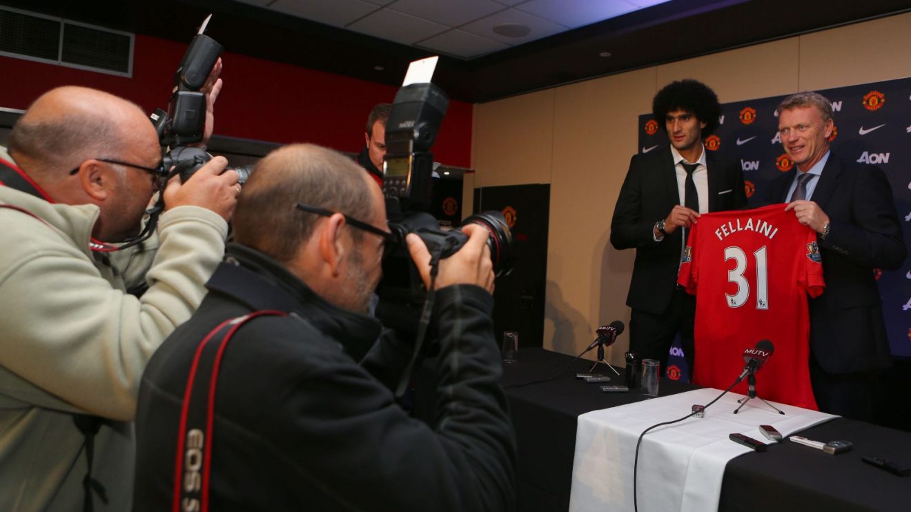 Marouane Fellaini is unveiled at Man Utd by David Moyes in front of photographers