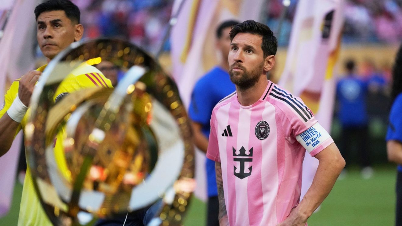 Lionel Messi with Club World Cup trophy