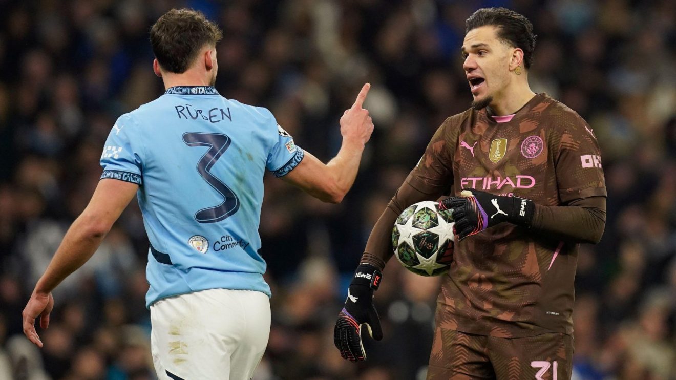 Man City players Ruben Dias and Ederson during a Champions League match