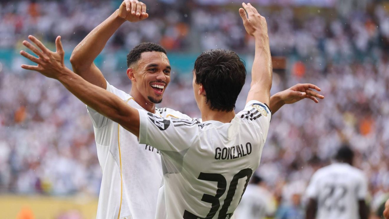 Trent Alexander-Arnold celebrates a goal with Gonzalo Garcia