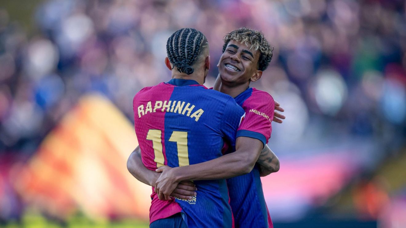 Barcelona duo Lamine Yamal and Raphinha celebrate a goal