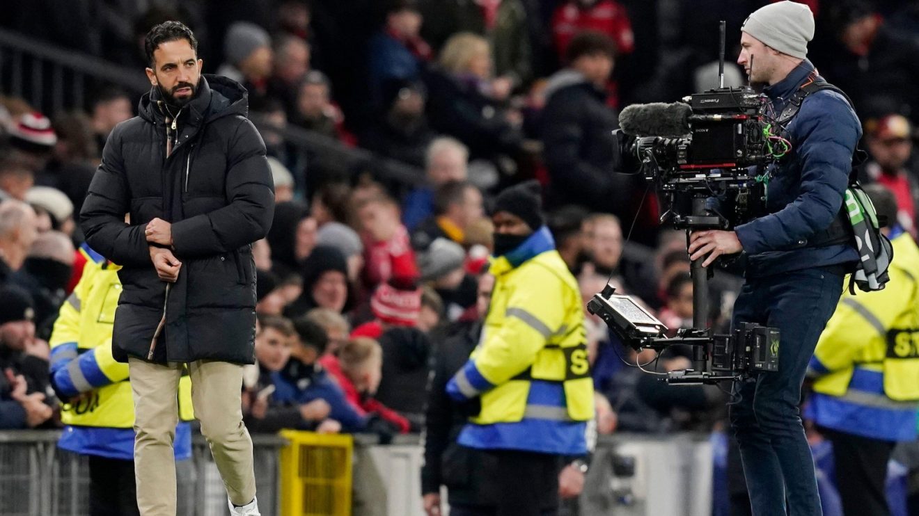 A TV camera follows Ruben Amorim.