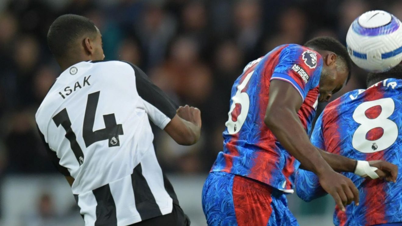 Newcastle striker Alexander Isak and Crystal Palace defender Marc Guehi compete for the ball