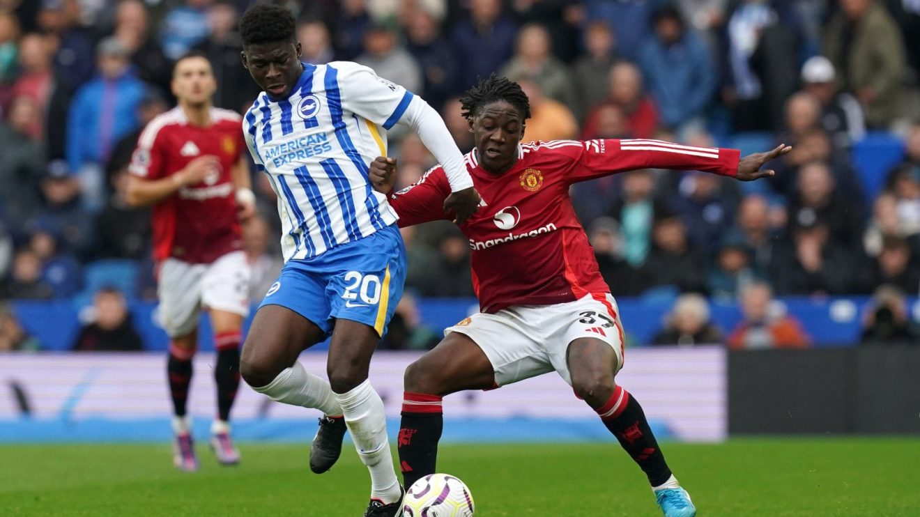 Brighton v Man Utd: Carlos Baleba and Kobbie Mainoo compete for the ball
