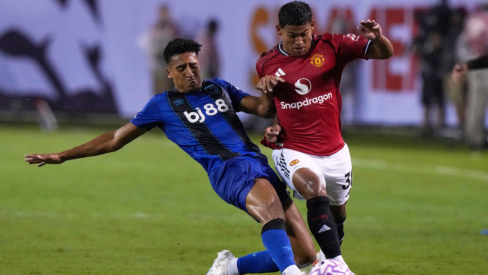 Bournemouths James Hill tackles Diego Leon