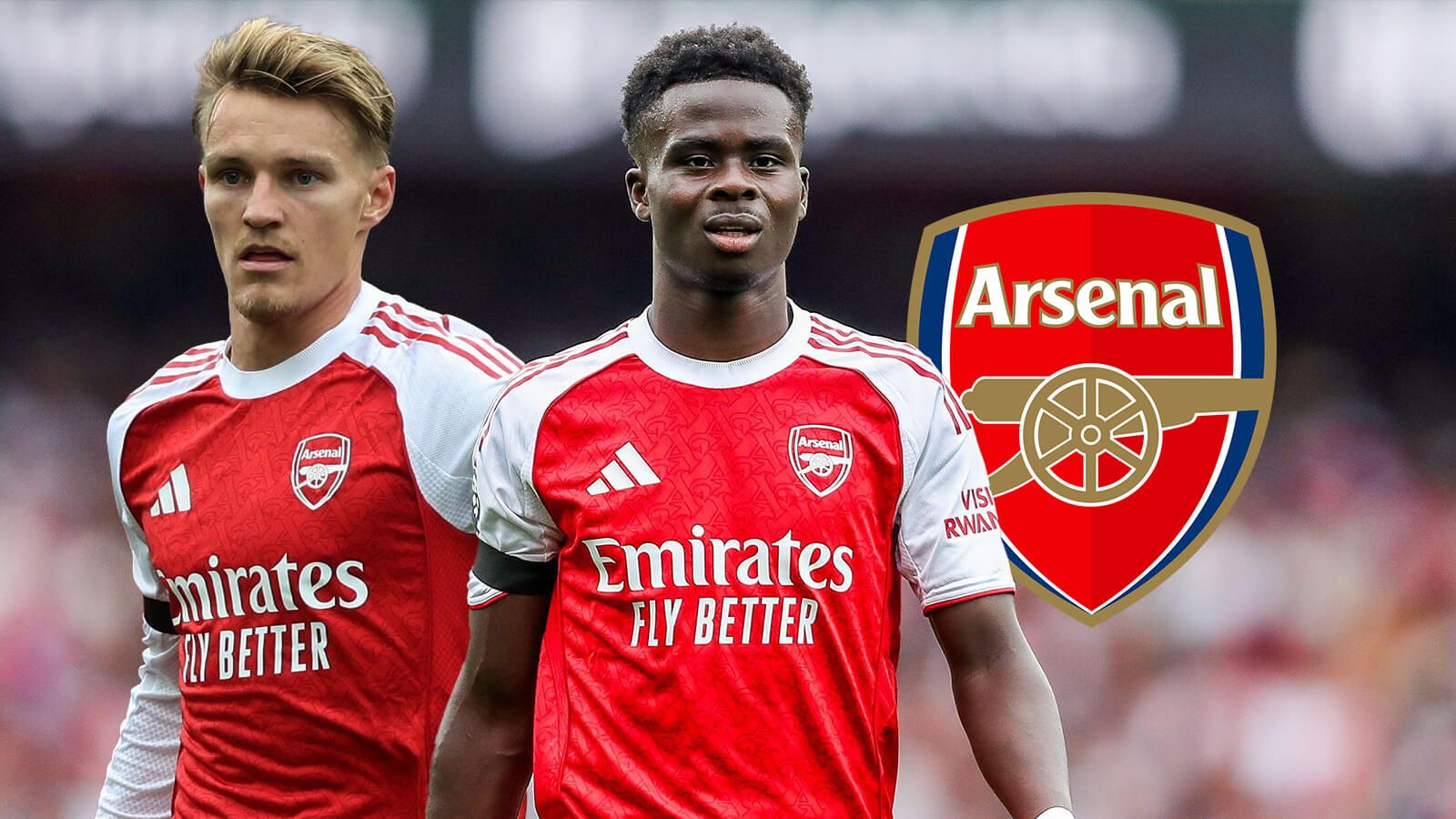 Bukayo Saka and Martin Odegaard with Arsenal badge