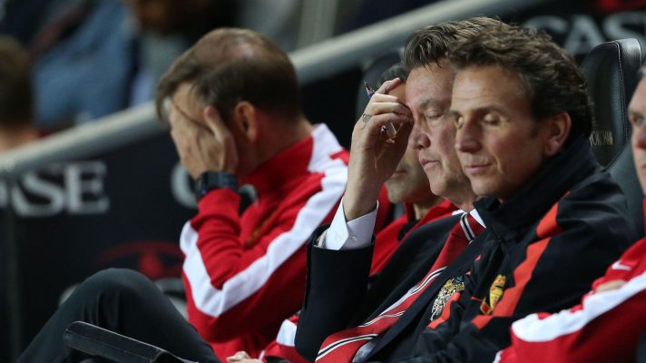 Louis van Gaal and Manchester United's coaches react against MK Dons