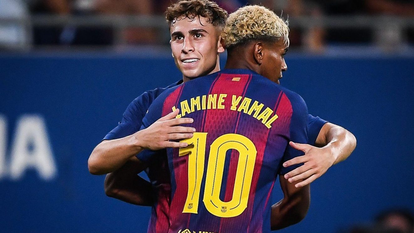 Barcelona players Fermin Lopez and Lamine Yamal celebrate a goal
