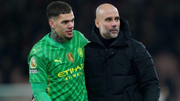 Manchester City manager Pep Guardiola and Ederson.