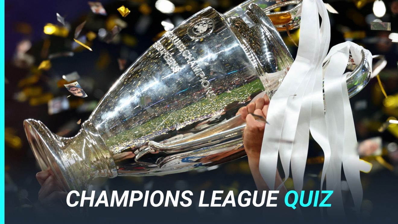 The Champions League trophy with white ribbons.