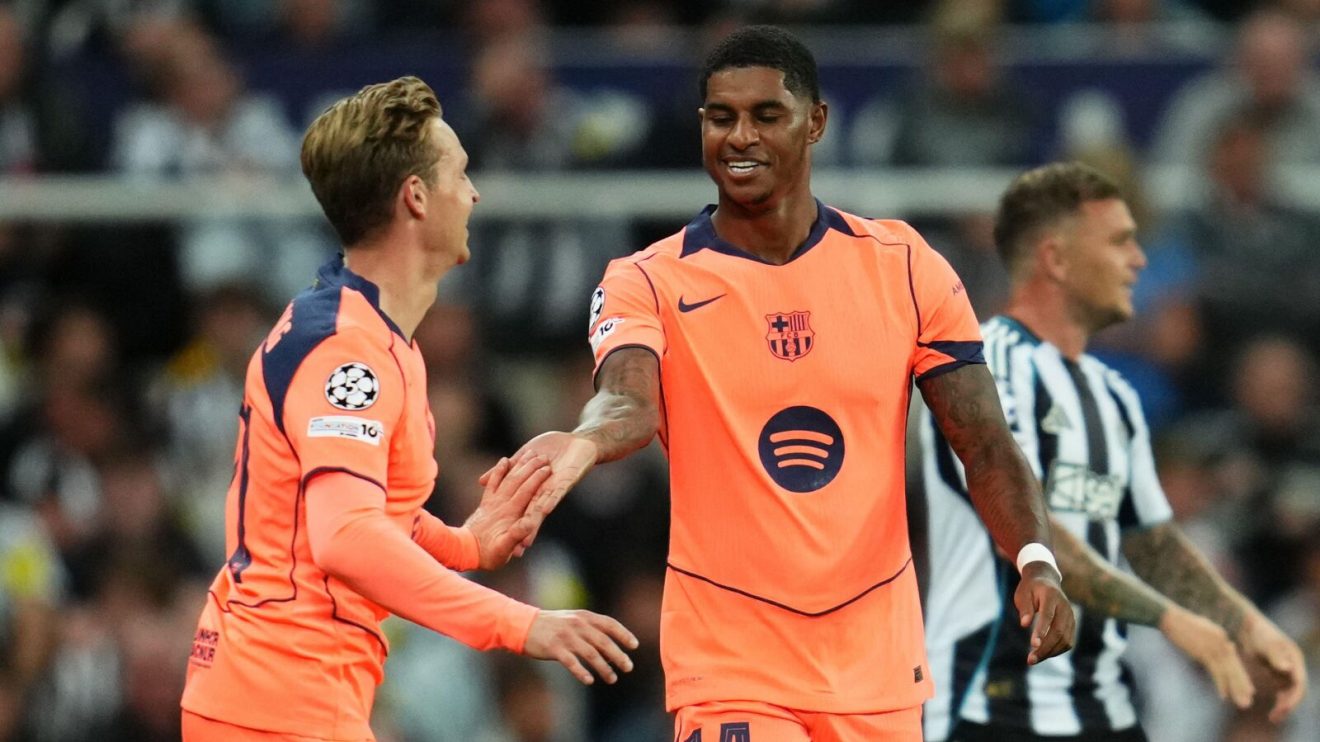 Marcus Rashford celebrates the first of his two goals as Barcelona beat Newcastle 2-1 in the Champions League