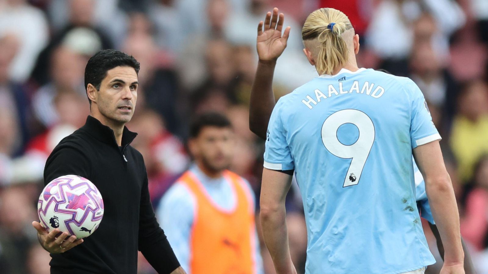 Mikel Arteta and Erling Haaland