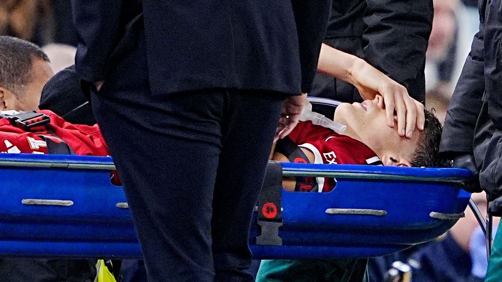 Liverpool defender Giovanni Leoni on a stretcher
