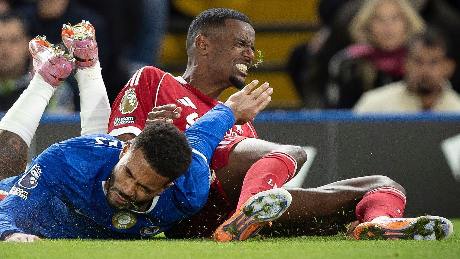 Chelsea defender Reece James tackles Liverpool forward Alexander Isak