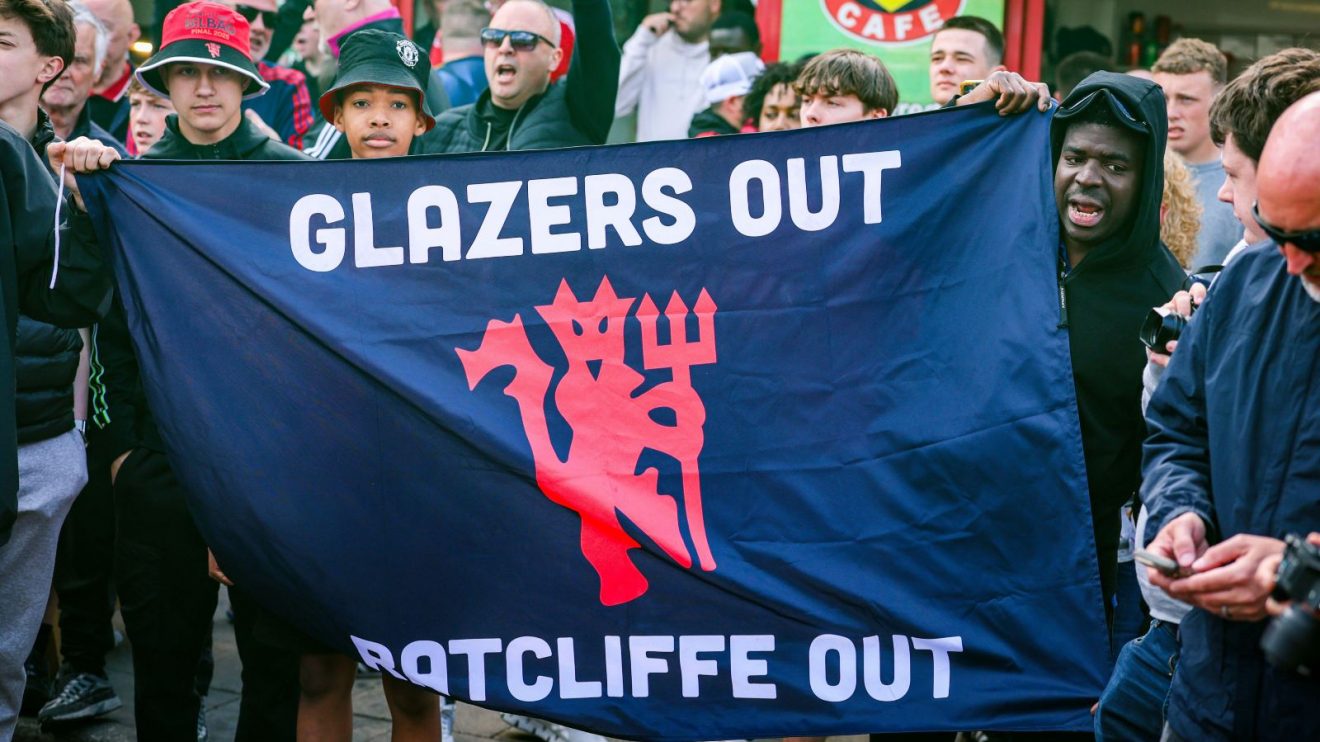 Male Utd supporters by means of a banner