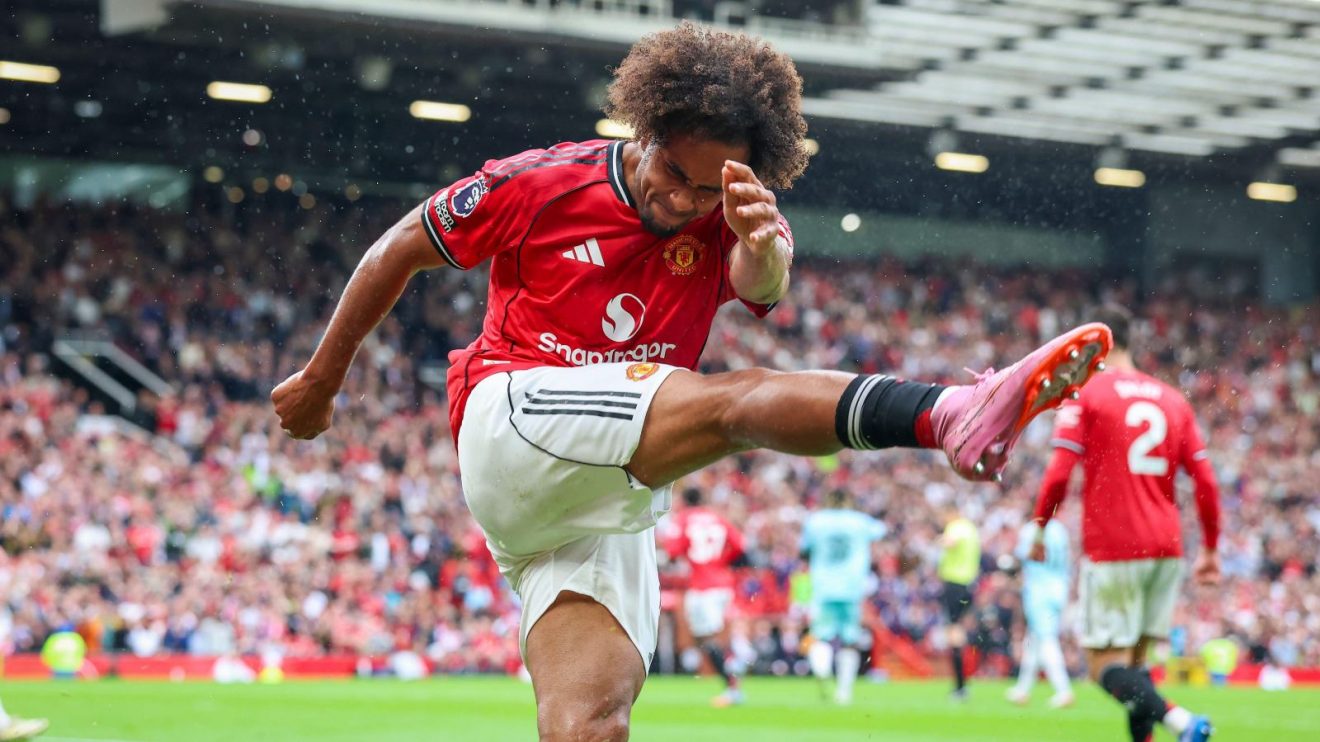 Man Utd forward Joshua Zirkzee kicks a bottle in frustration