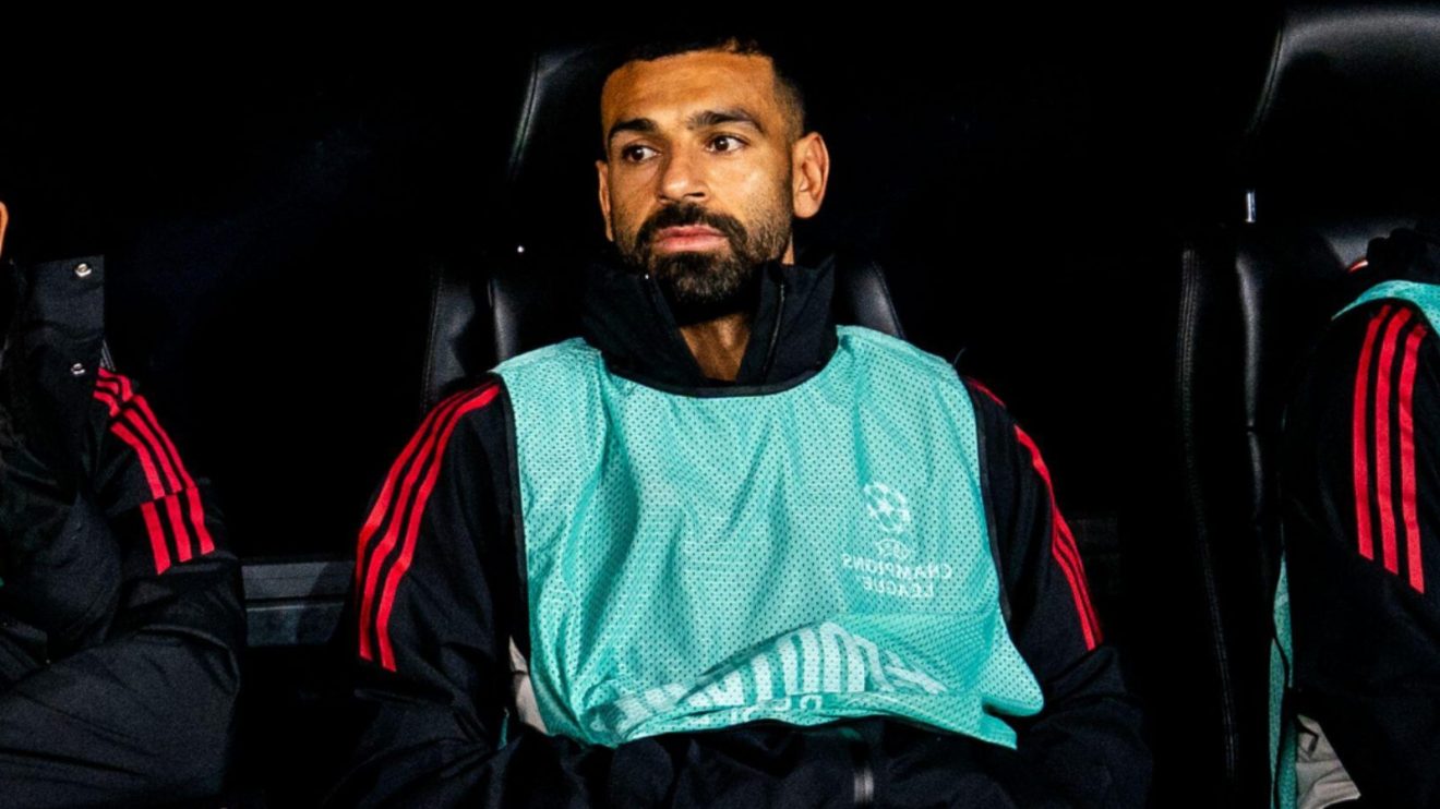 Liverpool superstar Mohamed Salah sits on the bench