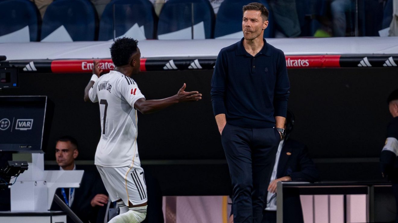 Real Madrid manager Xabi Alonso stands as Vinicius Jr protests his substitution