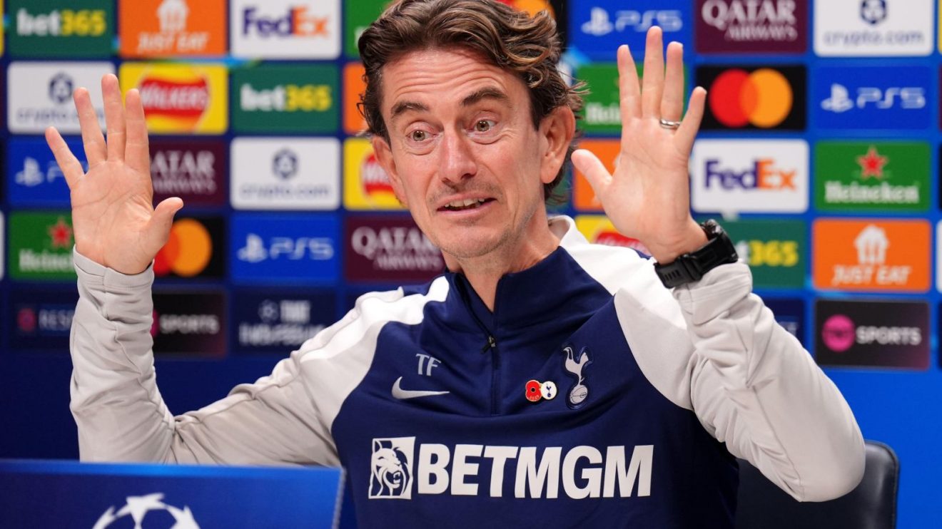 Spurs head coach Thomas Frank gestures during a press conference