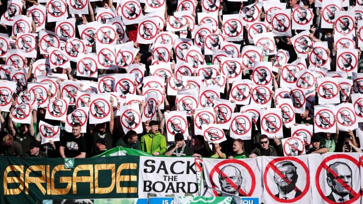 Celtic fans against the board
