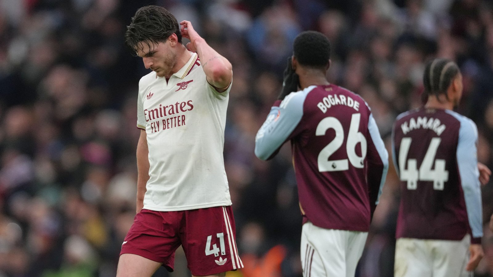 Arsenal midfielder Declan Rice with Aston Villa players 1