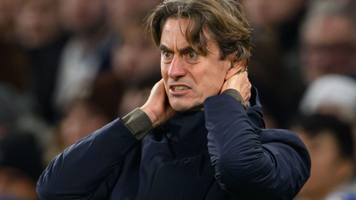 Spurs boss Thomas Frank looks dejected during a match
