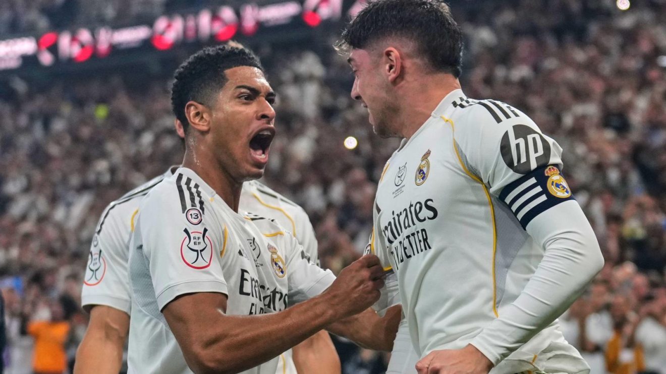 Real Madrid star Jude Bellingham celebrates a goal with Fede Valverde