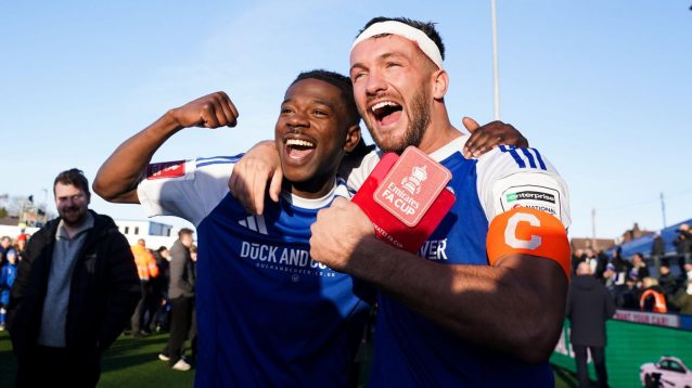 Macclesfield celebrate winning in the FA Cup