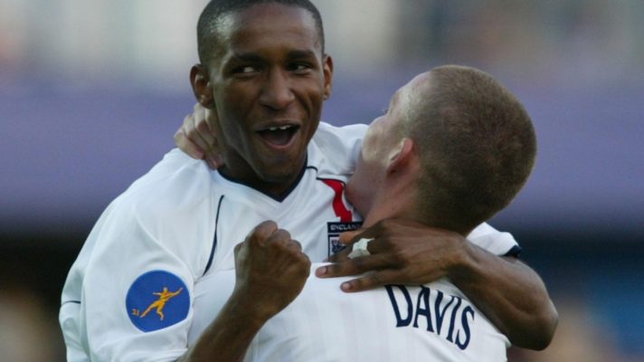 England U21 striker Jermain Defoe celebrates with Sean Davis