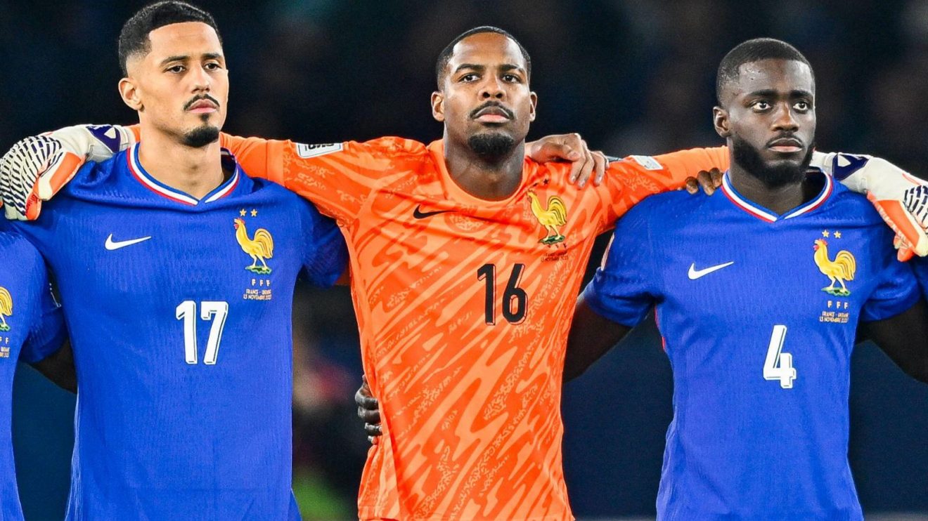 Liverpool target Dayot Upamecano (right) lines up for France