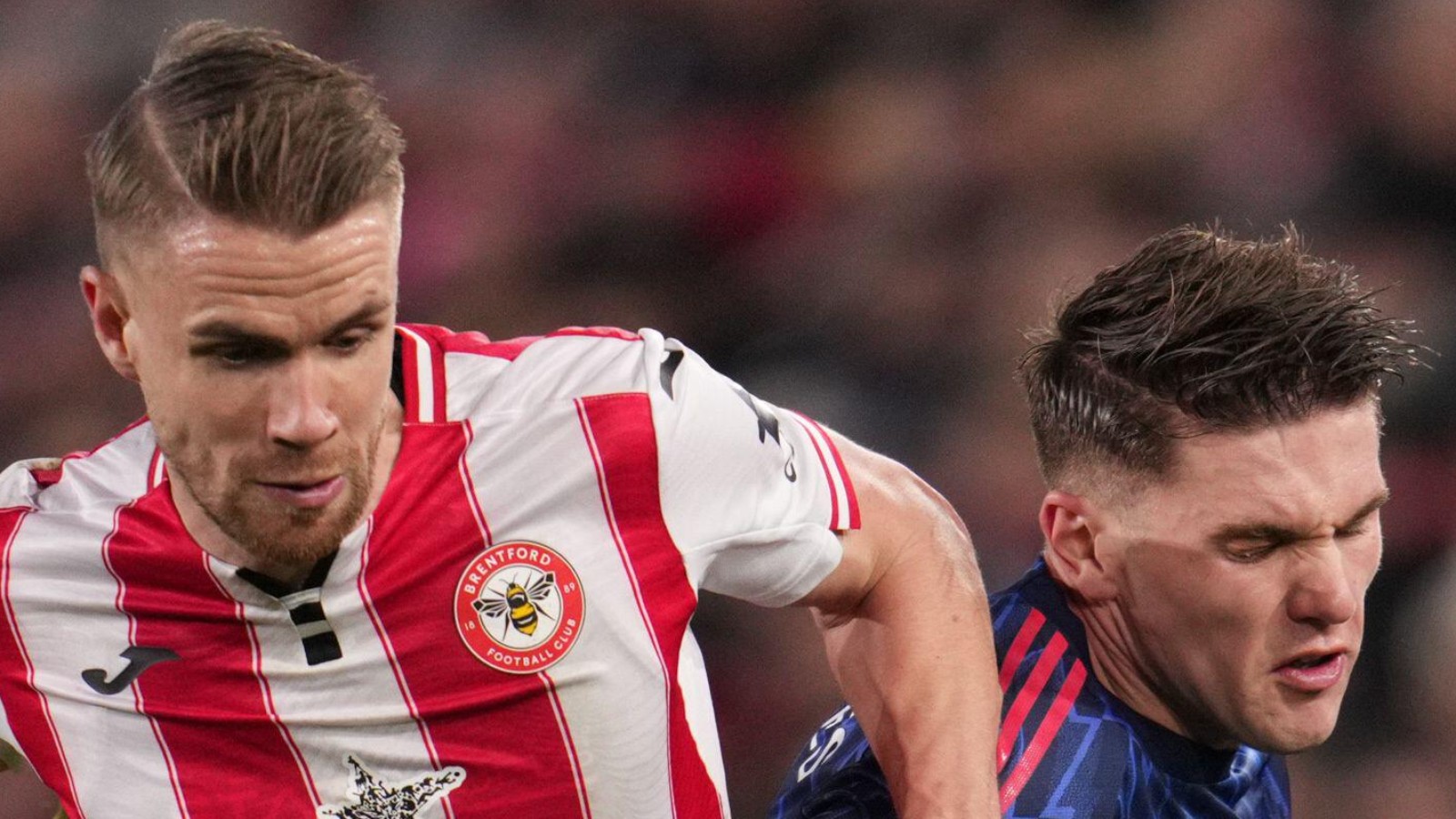Brentford defender Kristoffer Ajer competes for the ball with Arsenal forward Viktor Gyokeres